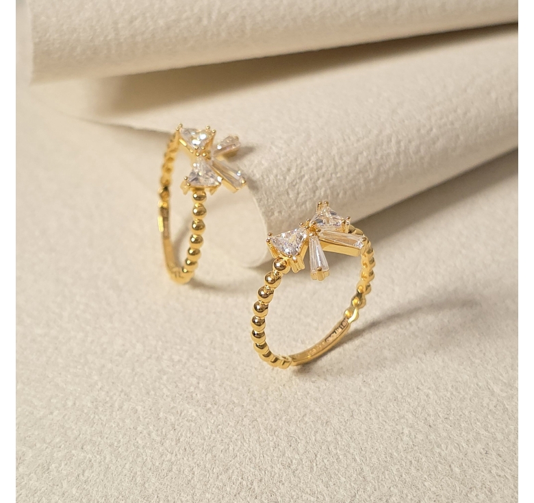 Nhẫn Nơ Đá Trắng Đai Bi Trơn 16K